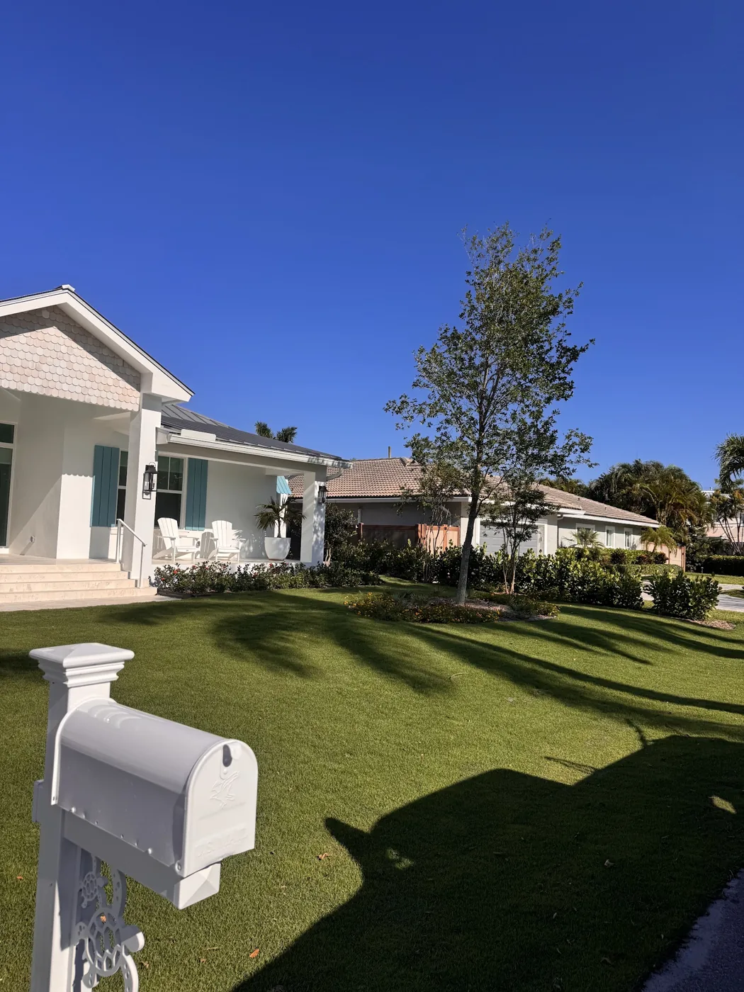 Fresh green front lawn and landscaping at a South Florida home